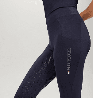 Model wearing branded leggings